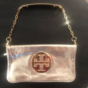 Tory burch gold clutch bag